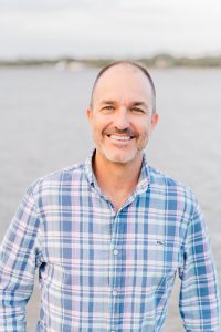 Dr. Chris West